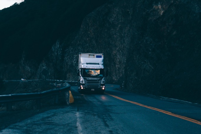 White Truck Driving Through The Night